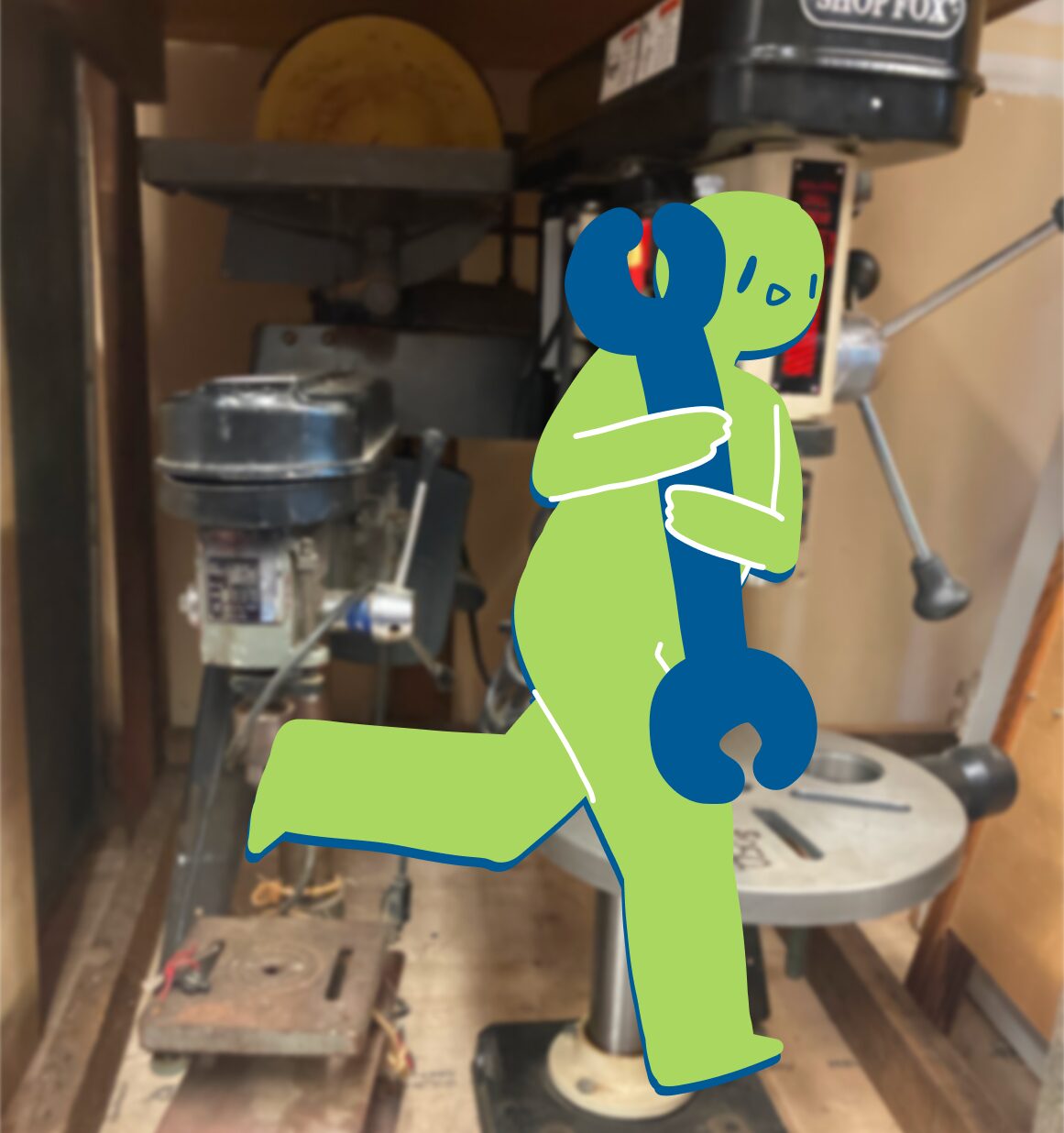 Green Guy running towards the right, holding a large wrench. The background image is of two drill presses available for purchase at the Shoreline Tool Library.